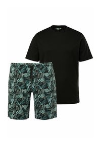 Zwarte katoenen T-shirt gecombineerd met shorts met een tropisch bladerenpatroon in teal en groen op een zwarte achtergrond. Elastische tailleband op de shorts.