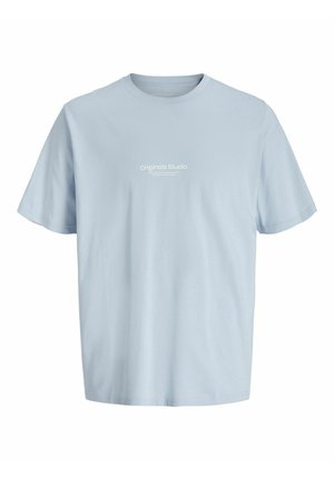 Világoskék, rövid ujjú pamut póló, melynek elején fehér betűkkel a "Originals Studio" felirat található. Sima tapintás.