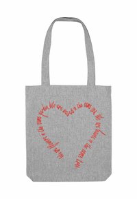 Borsa tote in tessuto grigio con testo rosso a forma di cuore: "Siamo fatti nello stesso giardino. Siamo onde nello stesso mare." Manici lunghi.
