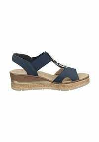 Sandale compensée bleu marine avec des lanières élastiques, design à bout ouvert, accents métalliques décoratifs et semelle en liège beige texturée.