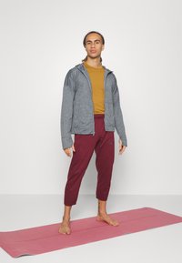 adidas Performance YOGA TRAINING - Träningsbyxor - shadow red
