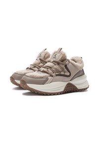 Chunky beige sneakers with thick white soles, plush shearling lining, textured brown rubber outsoles, and rope-style laces.