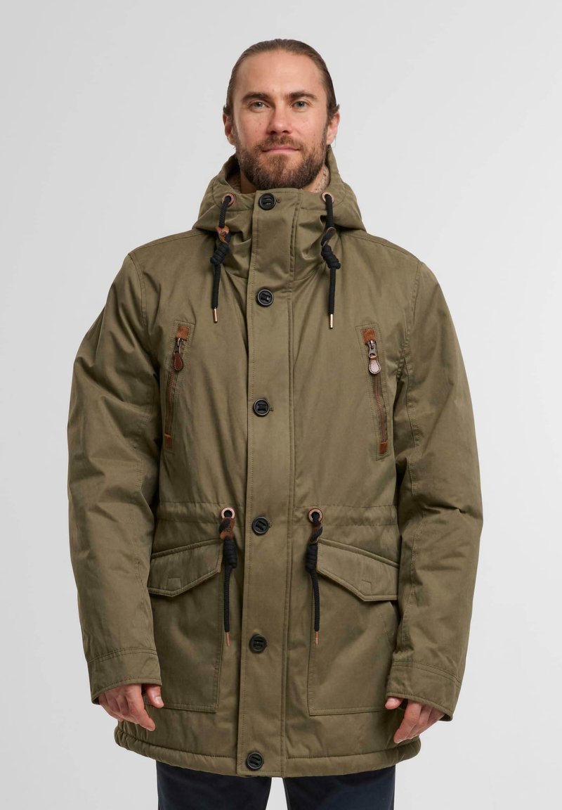 Green padded jacket with a high collar, drawstrings, two front pockets, and button closures. Features brown details and black accents.