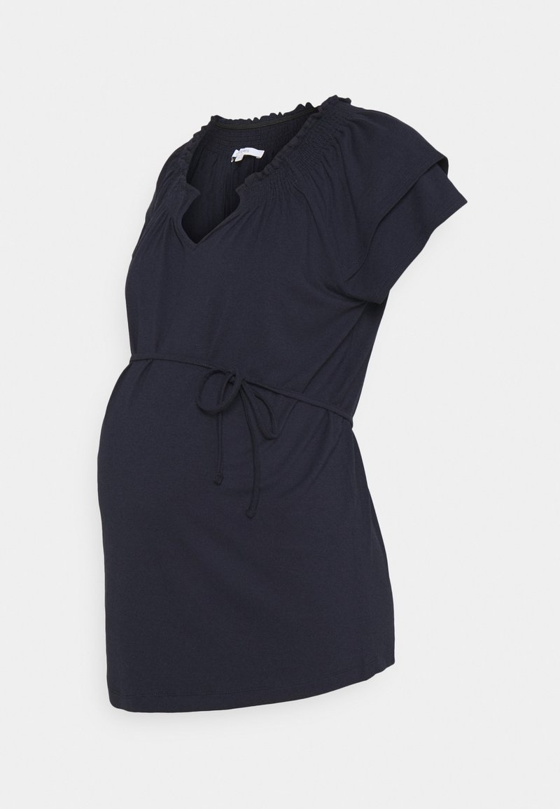 Dark navy maternity top with short ruffled sleeves, V-neck, and an adjustable tie at the waist. Made from soft, stretchy fabric.