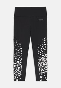 Svarta leggings med en tjock midja och en glänsande, mönstrad sidopanel med abstrakta former. Tillverkade av stretchigt, andningsbart material.