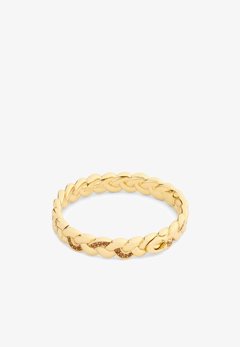 Guldtonad armband med flätad design och släta länkar, prydd med små accenter av bruna stenar för extra detalj.