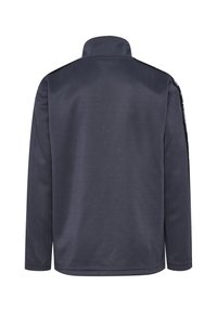 Marinefarbener Langarm-Jacke mit hohem Kragen, aus strukturiertem Stoff, geradem Schnitt und dezentem Branding entlang der Schulterstreifen.