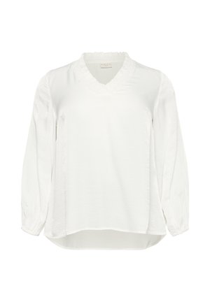 Blusa bianca a maniche lunghe con colletto a V volants e polsini elasticizzati, orlo posteriore leggermente più lungo, realizzata in tessuto leggero.