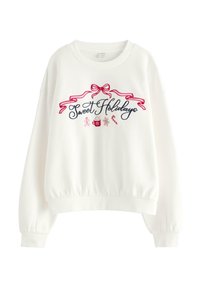 Hvid sweatshirt med broderet "Sweet Holidays" i marineblå og rød, med bånd og ferie-tematiserede detaljer samt elastiske manchetter.