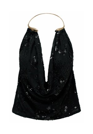 Haut noir à sequins avec col halter, décolleté plongeant et détail de col en métal doré.