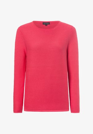 Roze langemouwen top met een gestructureerd ribbelpatroon en een ronde halslijn, gemaakt van een gladde stof. Etiket zichtbaar aan de binnenkant van de halslijn.