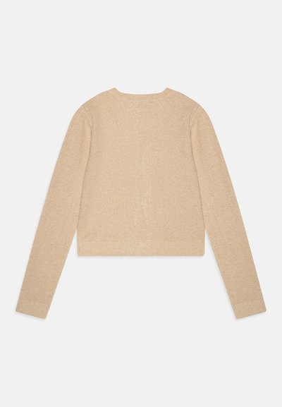 Beige, rövidített pulóver hosszú ujjakkal, bordázott textúrával és kerek nyakkivágással. Az anyaga lágy, enyhe fényhatással rendelkezik.