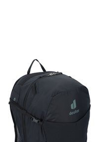 Black backpack featuring durable fabric, a rounded top, multiple compartments, adjustable straps, and a logo in teal on the side.
