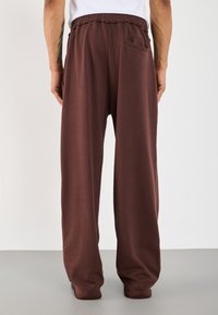 YOURTURN UNISEX - Træningsbukser - brown