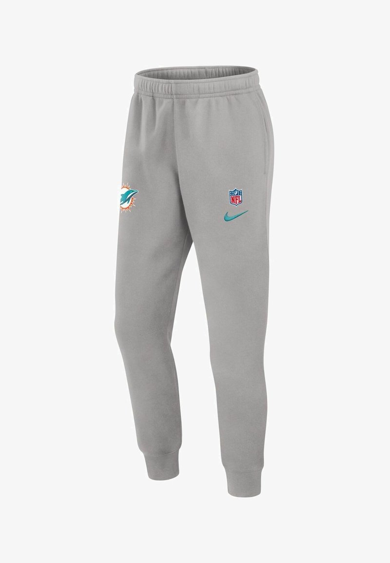 Light gray sweatpants with elastic waistband, featuring Miami Dolphins logo, NFL shield, and Nike swoosh in teal. Soft texture and tapered fit.