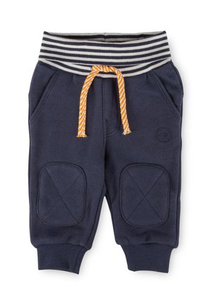Marineblaue Sweatpants mit gestreiftem elastischen Bund und orangefarbenem Kordelzug. Sie haben zwei seitliche Taschen und Knie-Patches mit X-förmiger Naht.