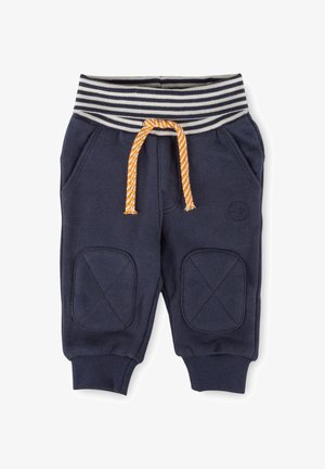 Marineblaue Sweatpants mit gestreiftem elastischen Bund und orangefarbenem Kordelzug. Sie haben zwei seitliche Taschen und Knie-Patches mit X-förmiger Naht.