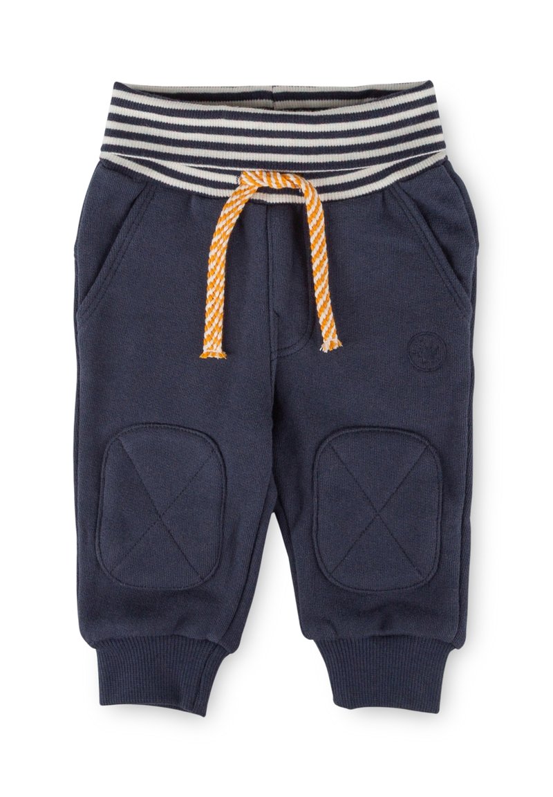 Marineblaue Sweatpants mit gestreiftem elastischen Bund und orangefarbenem Kordelzug. Sie haben zwei seitliche Taschen und Knie-Patches mit X-förmiger Naht.