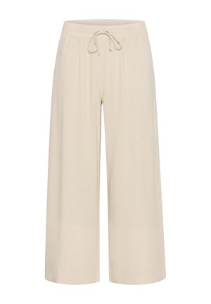 Beige weite Hose mit elastischem Bund und Kordelzug. Sie zeichnet sich durch eine weiche Textur und einen lockeren Schnitt aus, geeignet für die Freizeit.