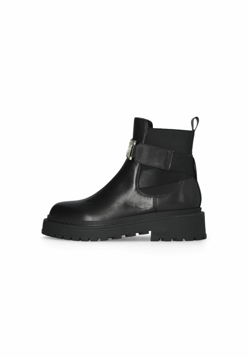 Black leather ankle boot with a rubber sole, a side elastic panel, and a decorative strap with a silver buckle detail.