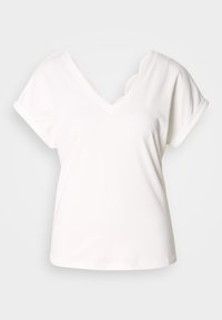 T-shirt blanc à manches courtes avec un col en V et des accents en dentelle festonnée le long de l'encolure, fabriqué en coton doux.