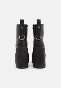 Buffalo KILLAH ZIP BOOT MID - Platform ankle boots - black