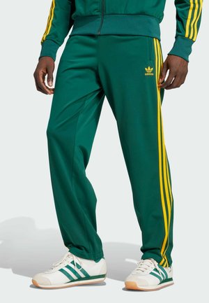FIREBIRD  - Pantalones deportivos - collegiate green   crew yellow