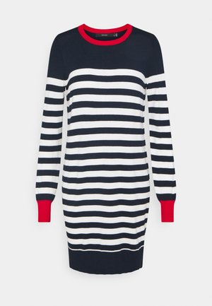 Vestito a righe navy e bianche con maniche lunghe. Presenta una scollatura rotonda rossa e polsini rossi. Tessuto a maglia morbida con una silhouette aderente.