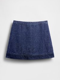 Denim nederdel i mørkeblå med et tekstureret mønster. Har en lige skæring og en jævn sømkant. Ingen synlige knapper eller lommer.