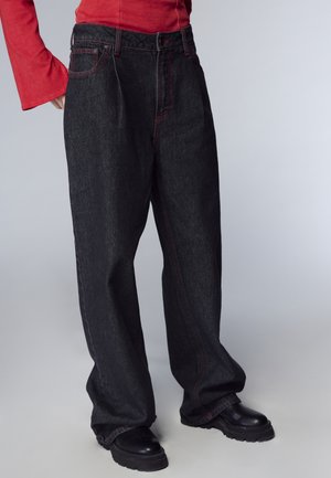 CON IMPUNTURE A CONTRASTO  - Jeans baggy - nero denim