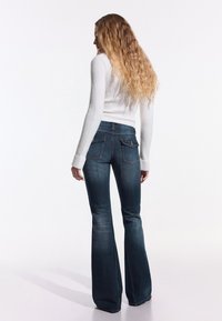 Bershka Flared Jeans - light-blue denim