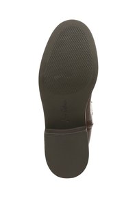 Bruine leren schoenenzool met textuur rubber voor grip, met een ronde vorm en subtiele stiksels langs de rand.