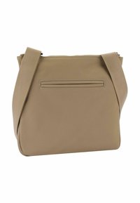 Tan crossbody bag with a soft, textured exterior, a zip closure, and a single strap. Features a horizontal pocket on the back.