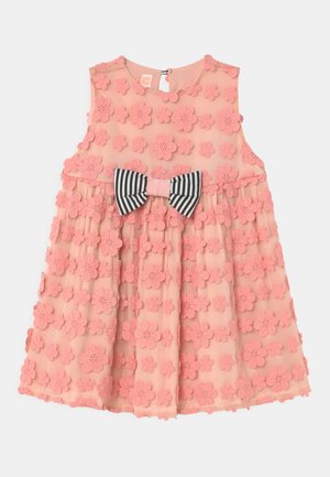 Pink sleeveless dress with a textured floral pattern, a layered ruffle design, and a striped bow accent at the waist.