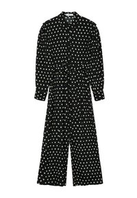 Schwarzer Jumpsuit mit weißem Punktmuster, langen Ärmeln, Knopfleiste, taillierten Bund und weit geschnittenen Beinen. Glatte Stoffoberfläche.