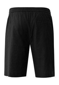 Pantalones cortos de algodón negros con una cintura elástica, corte recto y un único bolsillo trasero. Presentan una textura suave y un diseño sencillo.