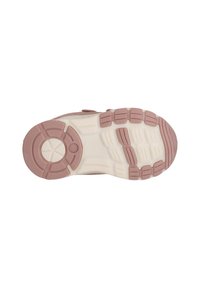 Sportlich gestaltete Schuhsohle in Pink und Weiß. Mit strukturiertem Gummi für guten Halt, kreisförmigen Mustern und multidirektionalen Stollen für Traktion.