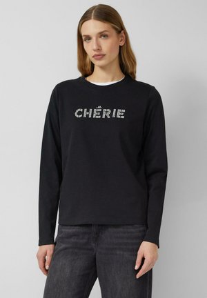 Schwarzes Langarm-T-Shirt mit dem Schriftzug "CHËRIE" aus Strasssteinen auf der Vorderseite, mit Rundhalsausschnitt und lockerer Passform.