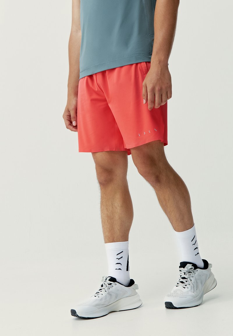 Born Living Yoga Korte broeken koraalrood Born Living Yoga Korte broeken koraalrood