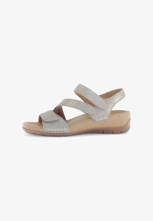 Silver metallic sandals with two adjustable straps, flat sole, and textured detailing on the band; lightweight design for comfort.
