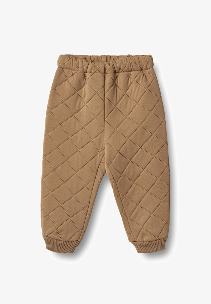 Tanhållande byxor med diamantmönster, elastisk midja och ribbade muddar vid anklarna. Tillverkade av mjukt, strukturerat material.