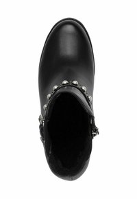 Black leather ankle boot featuring a rounded toe, metallic studs around the ankle, and a side zip closure. Soft interior lining.