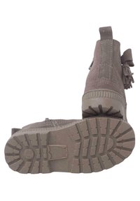 Pisamonas Botines - topo