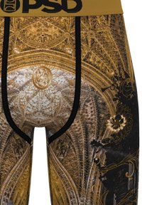 Dettagliato motivo gotico dorato sul soffitto di una cattedrale, su biancheria intima aderente nera e oro con rifiniture e fascia in vita nere.