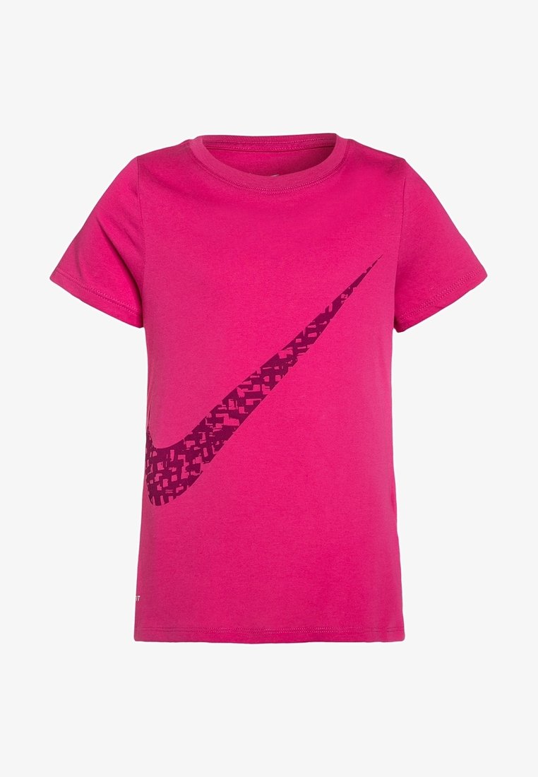 Pink cotton t-shirt featuring short sleeves and a large dark purple Nike logo with a geometric pattern, round neckline, and ribbed trim.
