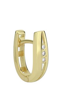Boucle d'oreille en métal doré en forme de cercle, présentant une forme ouverte en U avec des côtés lisses et polis, ornée de trois pierres transparentes sur un côté.