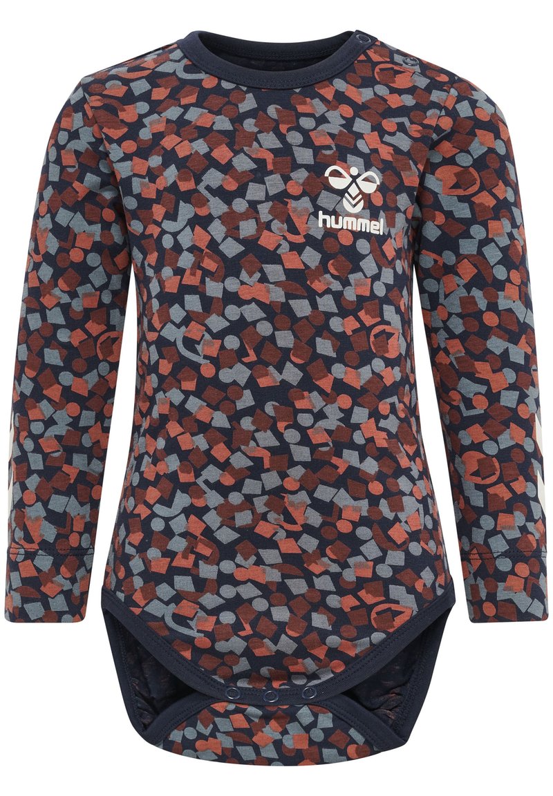 Långärmad bodysuit i marinblått med ett färgglatt geometriskt mönster av röda och grå former. Tryckknappar i botten för enkel omklädning.