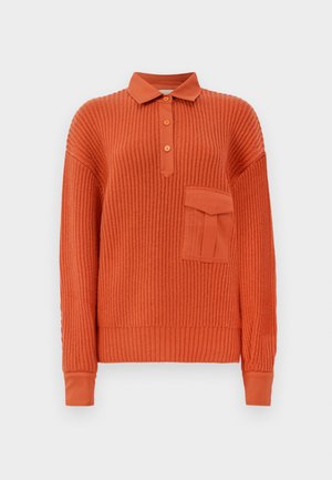 Ribbed orange pullover with a classic collar, three buttons, and a chest pocket. Soft texture with fitted cuffs and a relaxed shape.