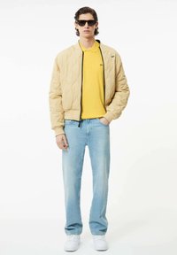 Lacoste Polo - jaune cornslik iy