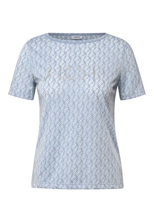 T-shirt azzurro chiaro in tessuto morbido, con un motivo a foglia, maniche corte e testo "Aloha" in rilievo sul davanti.